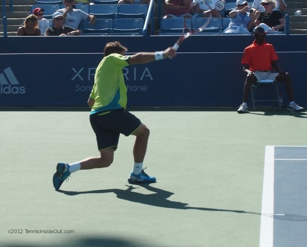 Stan Wawrinka one hander backhand crouch dig Cincinnati Open pictures