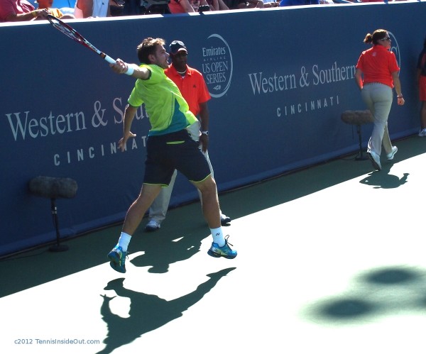 Cincinnati Open Stan Wawrinka flying backhand airborne BH yellow shirt Grandstand court 2012