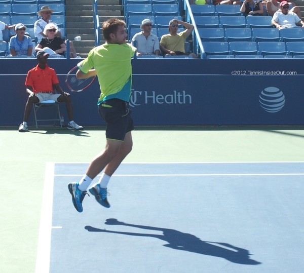 Stan Wawrinka airborne forehand follow through Cincinnati tennis shiny shoes pictures images photos