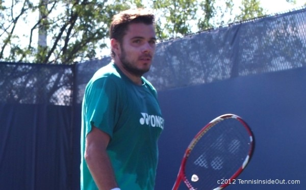Stanley Wawrinka Stanislas photos Western and Southern Open sunscreen sweaty shirt cheeks racquet pictures images
