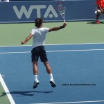 Roger Federer Western and Southern Open, Cincinnati Masters flying backhand by Valerie David one-handed flight white shirt navy shorts arms out tennis