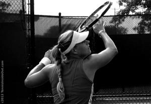Angelique Angie Kerber lining up overhead smash Cincinnati Open practice visor braid racquet photos pictures by Valerie David 2013