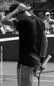 Beautiful sexy pose Roger Federer sweaty back muscles curvy bum arse ass photos sweaty t-shirt shorts black and white photos elegant hand on head back of neck curls