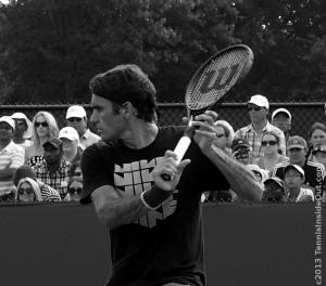 Roger Federer eye on the ball Swiss tennis star backhand set-up elegant hands Wilson raket curls photos images pictures Cincinnati Open
