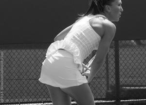Cincinnati Jelena Jankovic serve follow through ruffled white tennis dress Fila photos