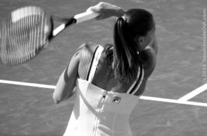 Jelena Jankovic forehand swing strong back arm muscles black white yellow Fila dress ponytail Prince racquet