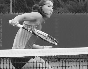 Beautiful Jelena Jankovic backhand volley photo by Valerie David striped Fila kit hair ponytail face photos pictures Cincinnati Practice 2014