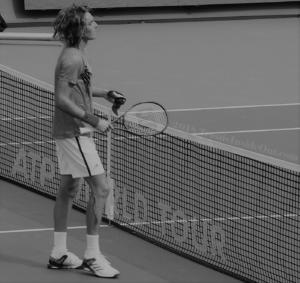 Stefanos Tsitsipas wild untamed curls sweaty headband bloody leg Wilson racquet tennis warrior Cincy tennis